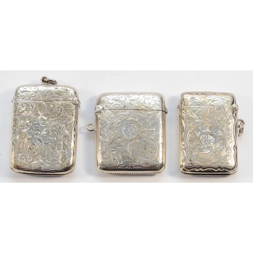 39 - Three silver vesta cases, Chester 1732,  Birmingham 1897, 1909, 102gm.