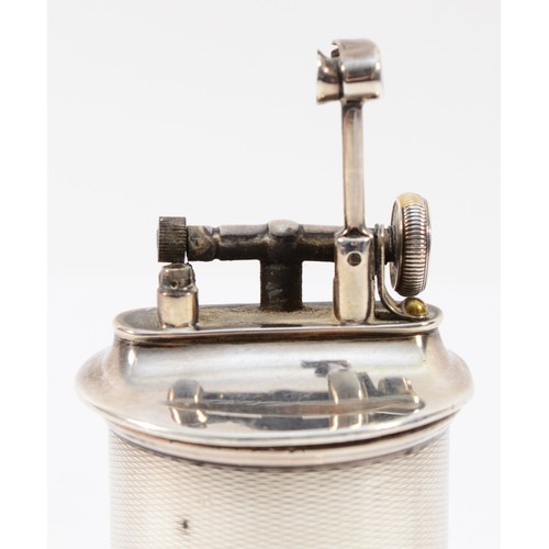 53 - A silver petrol table lighter, by John Collard Vickery, Birmingham 1928, 9cm tall.