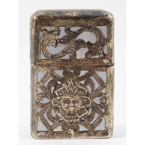 52 - A Mexican sterling silver Zippo style petrol lighter with Aztec motif to the front.