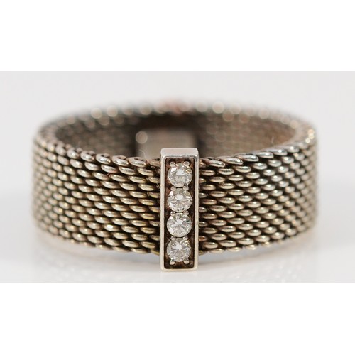 76 - Tiffany & Co, a 925 silver and brilliant cut diamond mesh ring, M, 4g with pouch