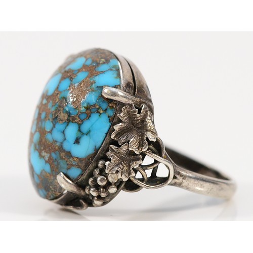 69 - An Arts & Crafts, probably Birmingham School of Arts & Crafts, turquoise matrix and silver ring, sho... 