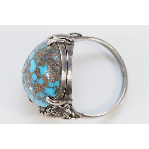 69 - An Arts & Crafts, probably Birmingham School of Arts & Crafts, turquoise matrix and silver ring, sho... 