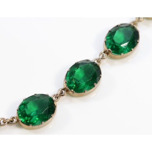 68 - A late 19th century Sterling Silver and green paste Riviera necklace, composed of twenty seven 11 x ... 