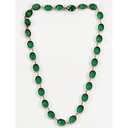 68 - A late 19th century Sterling Silver and green paste Riviera necklace, composed of twenty seven 11 x ... 