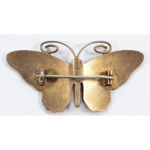 81 - Marius Hammer, a Norwegian silver gilt and enamel butterfly brooch, blue body and pink wings, 52mm w... 