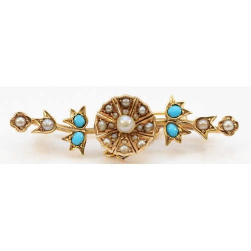 96 - A 15ct gold Victorian turquoise and seed pearl floral brooch, with a safety chain, 45mm across, 5.1g