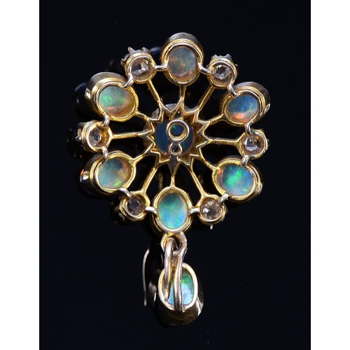 100 - A Victorian high carat gold, old cut diamond and opal pendant, lacking brooch fitting, 20mm diameter... 