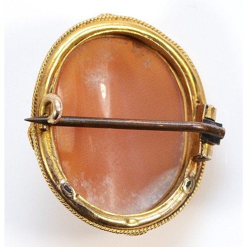 106 - A Victorian 9ct gold mounted shell cameo brooch of a gentleman wearing ruffles, possible knights hea... 