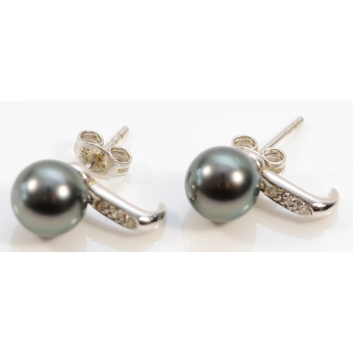 124 - A pair of 14k white gold single cut diamond and cultured pearl half hoop earrings, 6mm pearl, 2.7g