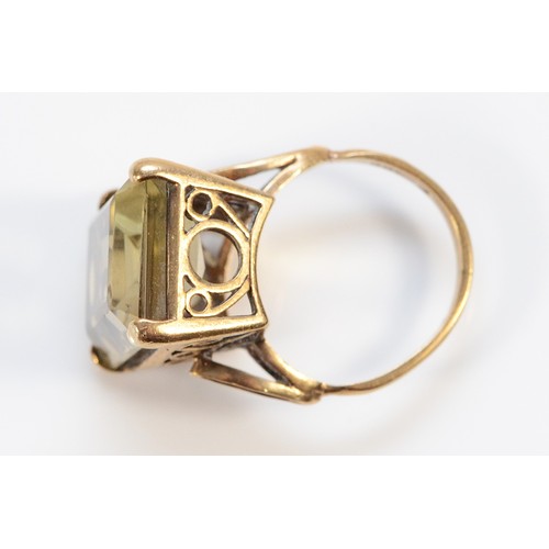 146 - A 9ct gold citrine cocktail ring, London 1975, 18mm x 14mm citrine, slightly misshapen band, J 1/2, ... 