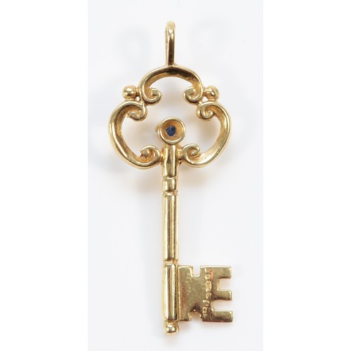 148 - A 9ct gold sapphire key charm, 30mm, 2.3g