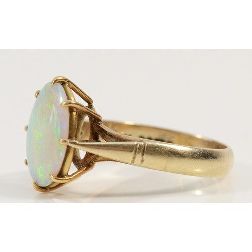 154 - A 9ct gold opal dress ring, 12mm x 9mm opal, L 1/2, 3.3g