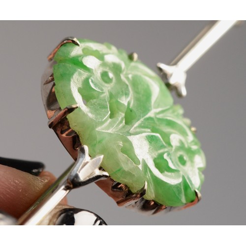 159 - A 9ct white gold floral carved jade Art Deco brooch, 65mm across, 6g