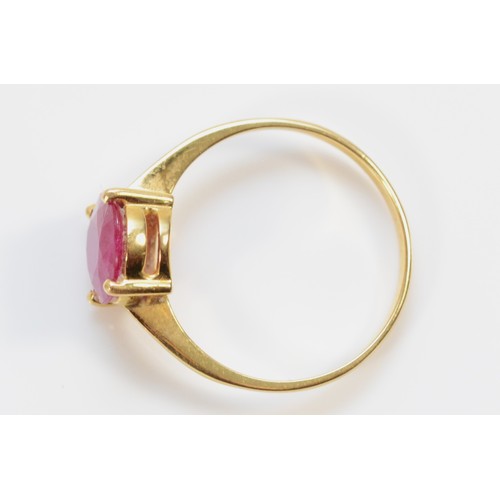 166 - An 18ct gold ruby solitaire ring, hallmarks have been polished away, calculated 3.3ct ruby, P 1/2, 3... 