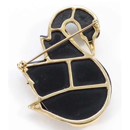 177 - A 9ct gold diamond, emerald and onyx brooch in the form of a swan, 48mm, 16.7g