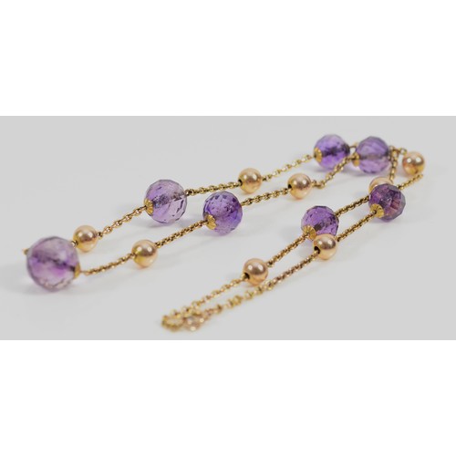 183 - An unmarked 9ct gold and amethyst bead necklace, graduating size of amethyst beads, largest 10mm, 40... 