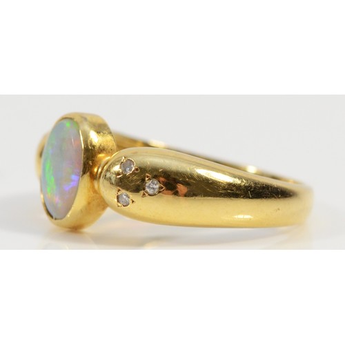 184 - An 18ct gold opal and diamond dress ring, central opal with three small diamonds on each shoulder, N... 