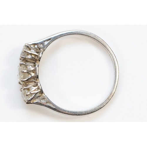 191 - A 950 platinum three stone brilliant cut diamond ring, hallmarks have been worn, N, 3.1g