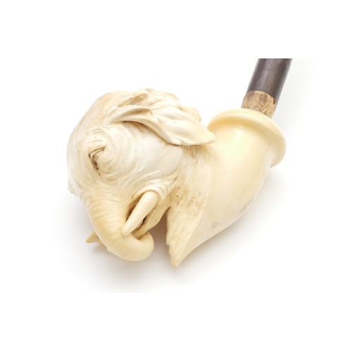 245 - An early 20th century meerschaum smoking pipe, having carved bowl in the form of an elephants head, ... 