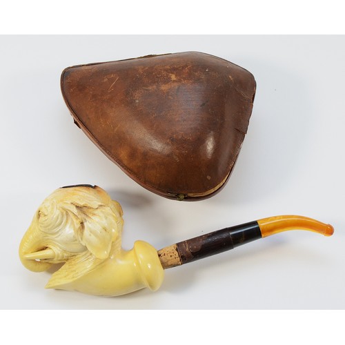 245 - An early 20th century meerschaum smoking pipe, having carved bowl in the form of an elephants head, ... 