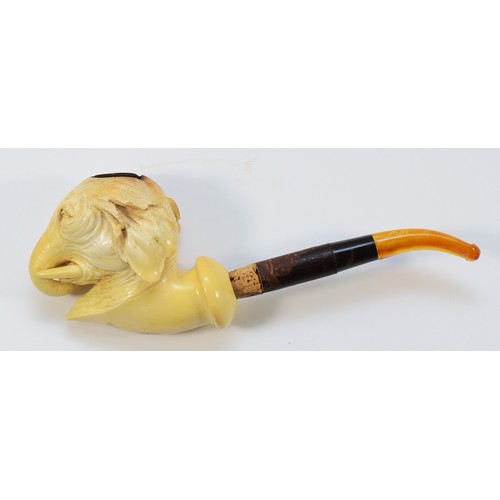 245 - An early 20th century meerschaum smoking pipe, having carved bowl in the form of an elephants head, ... 