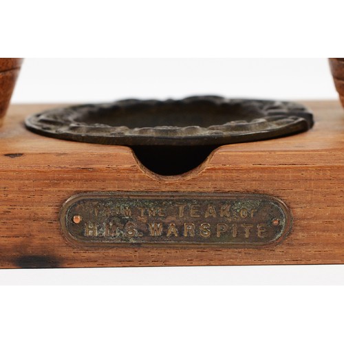 257 - A smoking stand carved from the timber of H.M.S. Warspite, H-19cm x 11.
HMS Warspite was one of five... 