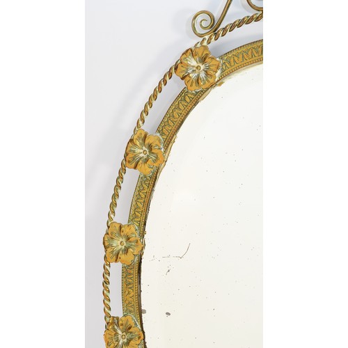 259 - A 1960's brass-framed wall mirror with bevelled edges and decorated with pansies, 51cm.