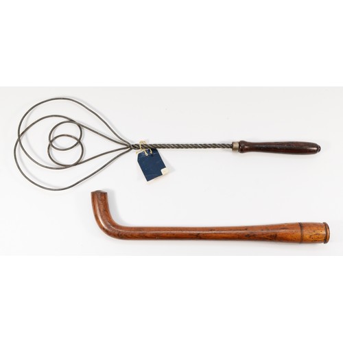 260 - A Victorian hardwood tipstaff, with a curved handle and a pokerwork embellishment, in the form of th... 