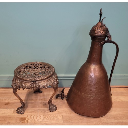 267 - A Persian copper ewer, 76cm, together with a freestanding gilt cast-metal plant stand, with scrollin... 