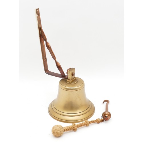 268 - A 20th Century brass ships bell with braided rope and hanging bracket, H-20cm. 

Provenance: Acquire... 