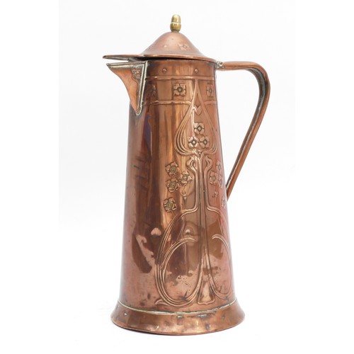 269 - An Arts and Crafts copper lidded flagon, in the style of Joseph Sankey, decorated with Art Nouveau f... 