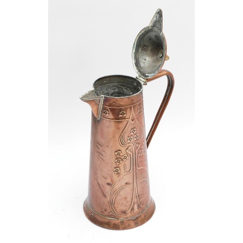 269 - An Arts and Crafts copper lidded flagon, in the style of Joseph Sankey, decorated with Art Nouveau f... 