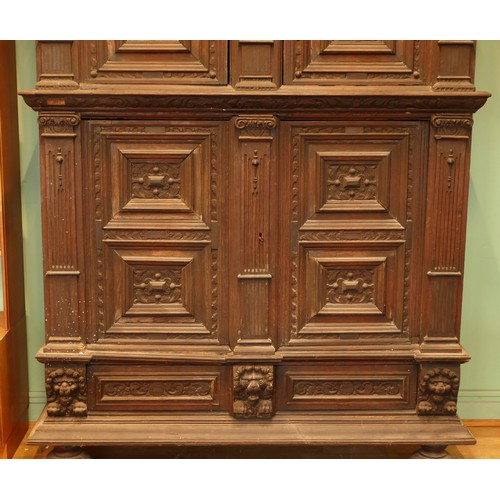 384 - A Dutch carved oak 'Zeeuwse Kast' or court cupboard, 17th century style, the rectangular moulded cor... 