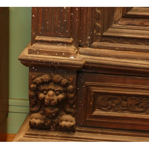 384 - A Dutch carved oak 'Zeeuwse Kast' or court cupboard, 17th century style, the rectangular moulded cor... 