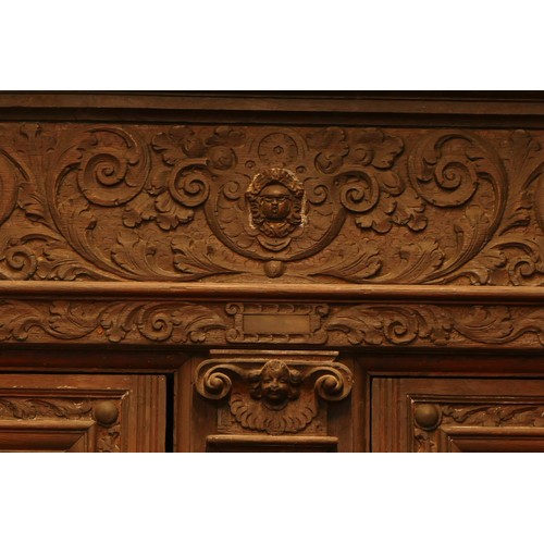 384 - A Dutch carved oak 'Zeeuwse Kast' or court cupboard, 17th century style, the rectangular moulded cor... 