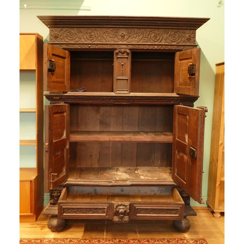 384 - A Dutch carved oak 'Zeeuwse Kast' or court cupboard, 17th century style, the rectangular moulded cor... 