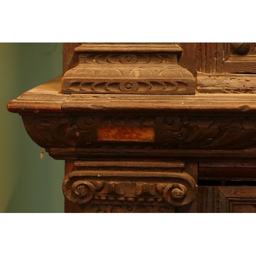 384 - A Dutch carved oak 'Zeeuwse Kast' or court cupboard, 17th century style, the rectangular moulded cor... 