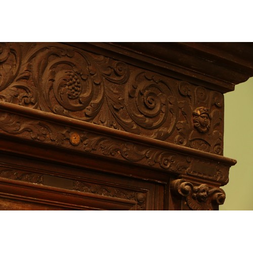 384 - A Dutch carved oak 'Zeeuwse Kast' or court cupboard, 17th century style, the rectangular moulded cor... 