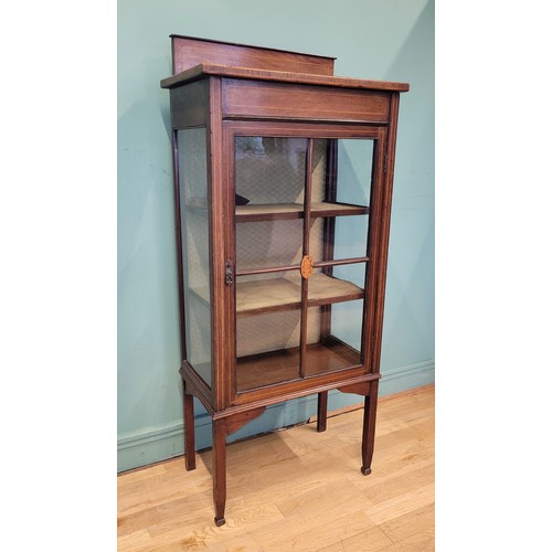 376 - An Edwardian mahogany inlaid display cabinet, having single beaded glazed door opening to fitted she... 