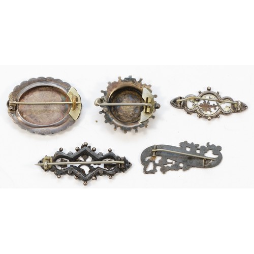 38 - Three 925 Victorian silver brooches, an unmarked silver round brooch and a 925 silver 