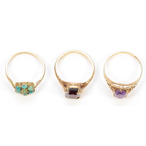 61 - A 9ct gold amethyst dress ring, O, 1.5g, a 9ct gold turquoise cluster ring, M, 1.7g, and a 9ct gold ... 