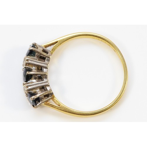 65 - An 18ct gold sapphire and diamond seven stone ring, Birmingham 1979, M 1/2, 3g