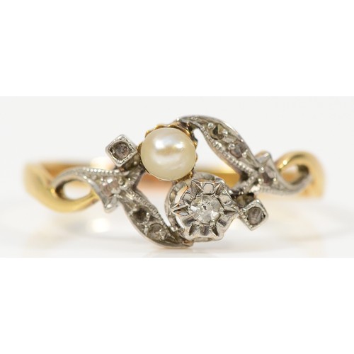 69 - An 18ct gold seed pearl and diamond dress ring, bearing the eagle hallmark, resizing is visible, S, ... 