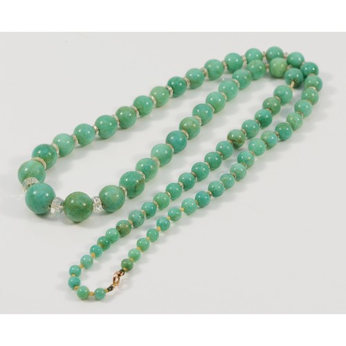 71 - A 9ct gold clasp amazonite and rock crystal beaded necklace, graduated beads, largest 13mm, 64.9g