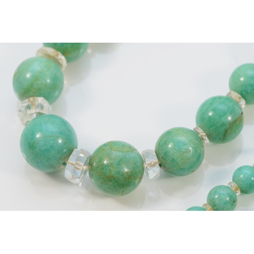 71 - A 9ct gold clasp amazonite and rock crystal beaded necklace, graduated beads, largest 13mm, 64.9g