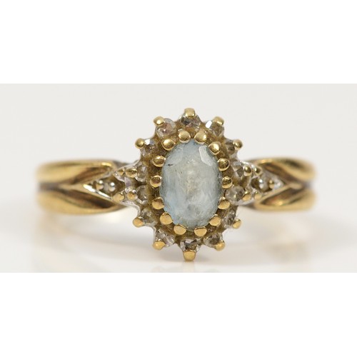 746 - A 9ct gold diamond and blue gemstone cluster ring, J 1/2, 2.9g