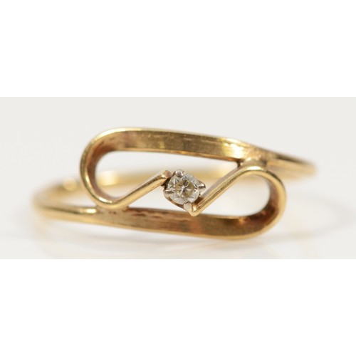 749 - A 9ct gold brilliant cut diamond ribbon loop ring, I 1/2, 0.9g