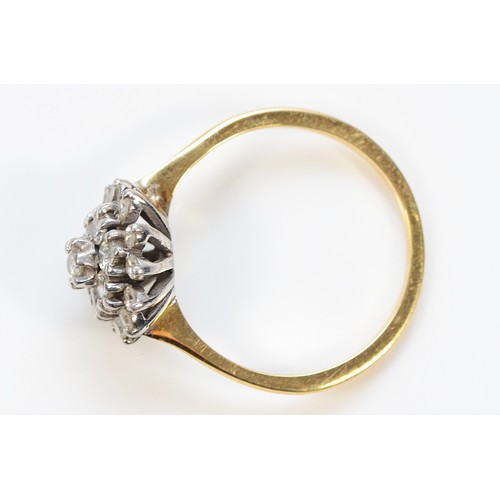 751 - An 18ct gold brilliant cut diamond cluster ring, N, 3g