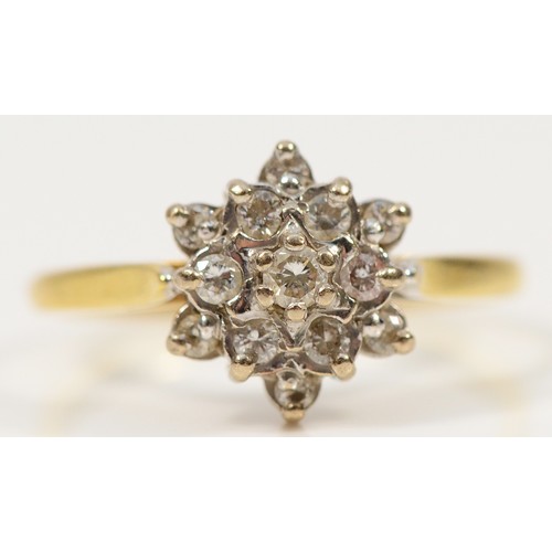 752 - An 18ct gold brilliant cut diamond floral cluster ring, N 1/2, 3.7g