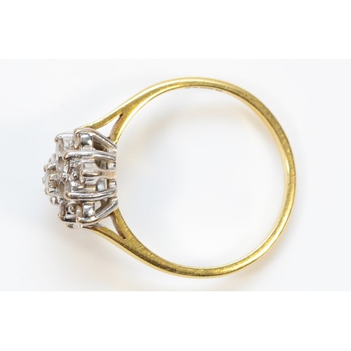 752 - An 18ct gold brilliant cut diamond floral cluster ring, N 1/2, 3.7g